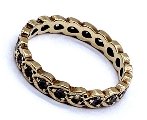 A 9ct gold eternity ring set with cubic zirconia, 1.6g total weight, size K.