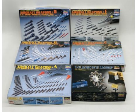 A collection of five boxed Hasegawa Aircraft Weapons plastic model kits including Set A - US Bombs & Tow Target System, Set B