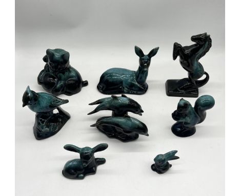 A collection of vintage Blue Mountain Ware Ceramic animal figurines to include Bird, Fawn, Squirrel, Cat, Dolphins etc.