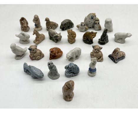 A collection of Wade Whimsies & Minikins animal figurines.