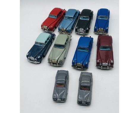A collection of twelve vintage Japanese friction powered Rolls Royce toy cars