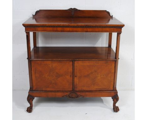 An antique Queen Anne style mahogany buffet, with two door cupboard under, with carved shell motif, raised on cabriole legs w