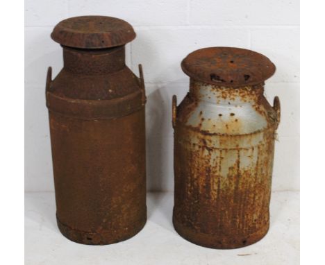 Two vintage weathered milk churns