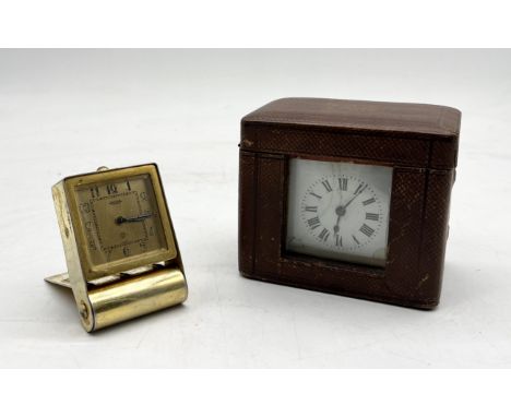 A leather cased French carriage clock of rectangular form along with a Jaeger travel alarm clock (A/F)