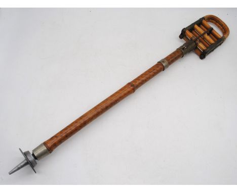 An antique bamboo shooting stick, marked 'John Collier'