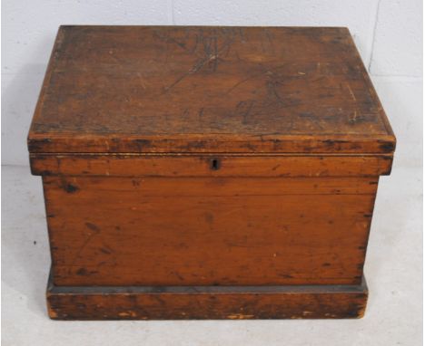 A small antique pine trunk - length 60.5cm, depth 45.5cm, height 41cm