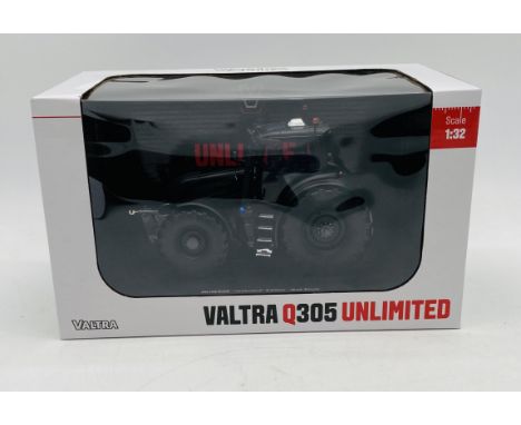 A boxed Universal Hobbies Valtra "Unlimited" Edition die-cast tractor in Matt Black (1:32 scale)