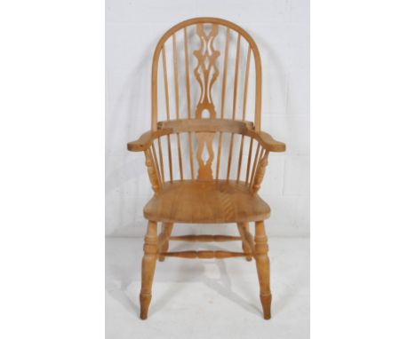 A Windsor stick-back chair, with turned supports 
