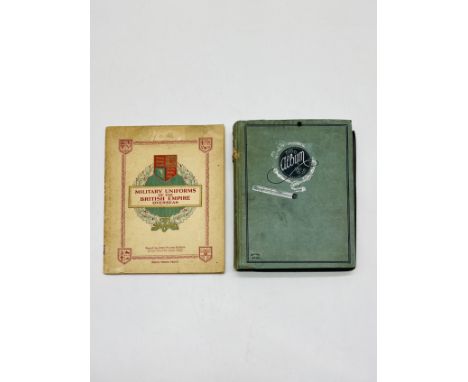 Two albums of vintage cigarette cards including Players & Wills along with some tea cards