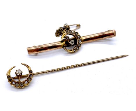 A Victorian gold bar brooch (tests as 9ct) set with old cut diamonds in a crescent moon shape and a similar tie pin- some dia