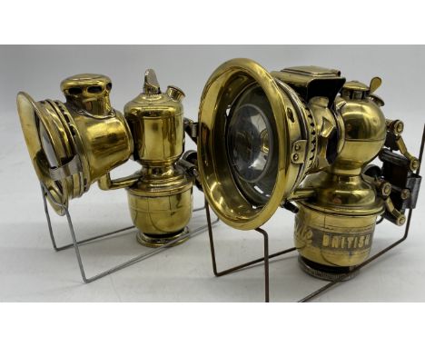 Two antique brass bicycle lamps- a Lucas 142D "Rubia" light with built in rear red light (circa1922) along with a Miller's Ce