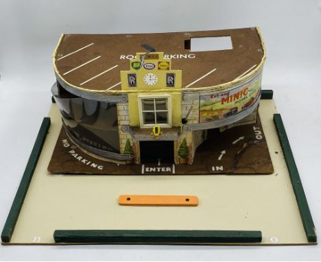 A vintage Tri-ang Minic Toys garage and showroom