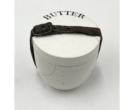 A "Coracle" ceramic butter pot with original leather strap - originally part of a larger picnic set