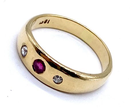 A 18ct gold ruby and diamond gypsy set ring, size S, 6.2g total weight