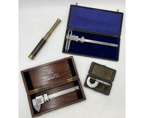 A selection of cased drawing instruments including Chesterman along with a Salmon & Co. telescope