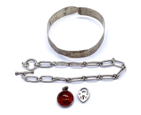 A sterling silver bar link bracelet, 25cm length, sterling silver buckle bangle, amber pendant etc.