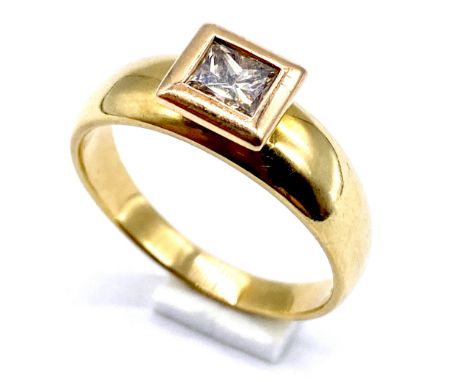 A 18ct gold princess cut solitaire diamond ring, 1/2 carat, size R 1/2, 6.5g total weight. 