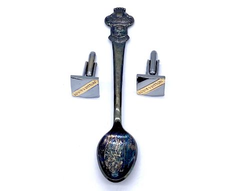 A Rolex Bucherer of Switzerland coffee spoon, and a pair of Louis Vuitton chrome cufflinks.