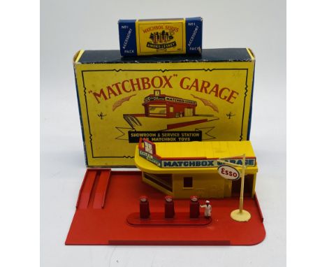 A vintage boxed Matchbox Garage Showroom & Service Station set, along with matching Accessory Pack No 1 comprising of Esso pe