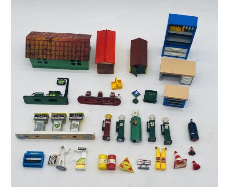 A collection of die-cast and plastic toys relating to a garage environment, including die-cast Timpo Toys BP & Shell petrol p