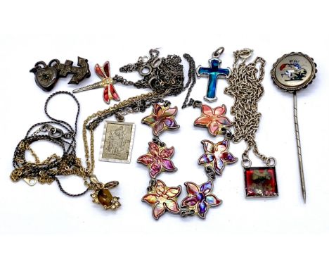 An enamel tie pin of St George and the dragon, silver St Christopher and chain etc.