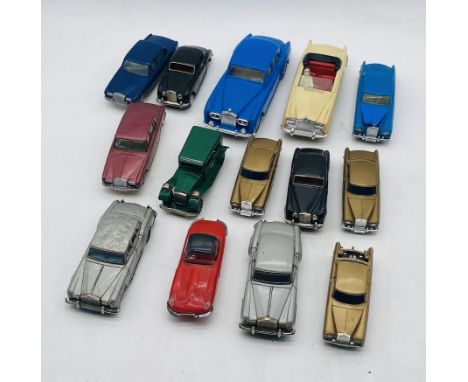 A collection of vintage friction powered Rolls Royce cars, mainly made in Hong Kong