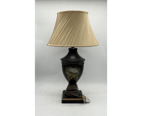 A classical style table lamp with vintage horse and jockey decoration to one side. Approximate height 72cm with shade. 