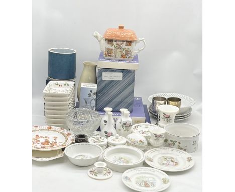 A large collection of assorted china including Wedgwood, Aynsley Sadler, Beatrix Potter, Denby, Royal Worcester etc in two bo