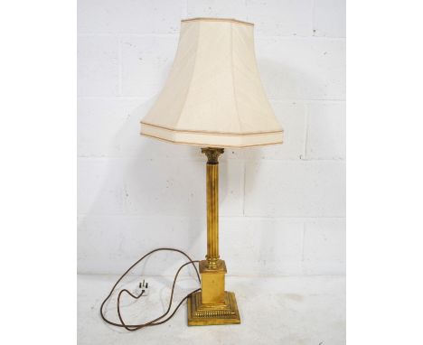 A brass Corinthian column table lamp - total height including shade 92cm