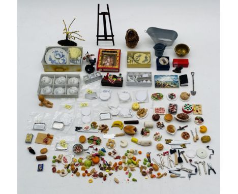 A collection of Dolls House accessories including ceramic tea sets, assorted china, tools, fruit, easel, bath, bucket, wicker