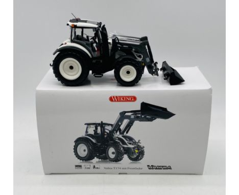 A boxed Wiking Valtra T174 with Front Loader die-cast tractor (1:32 scale)