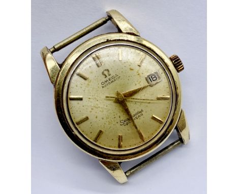 A gent's vintage Omega Seamaster calendar automatic wristwatch with gold plated case and steel back. Signed champagne dial wi