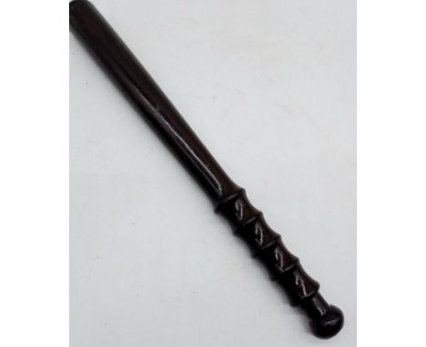 A vintage wooden truncheon with turned wooden handle, 39cm length.