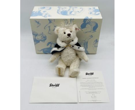 A limited edition boxed Steiff "Long To Reign Over Us" teddy bear in white with certificate (Numbered 64 of 2,015) and origin