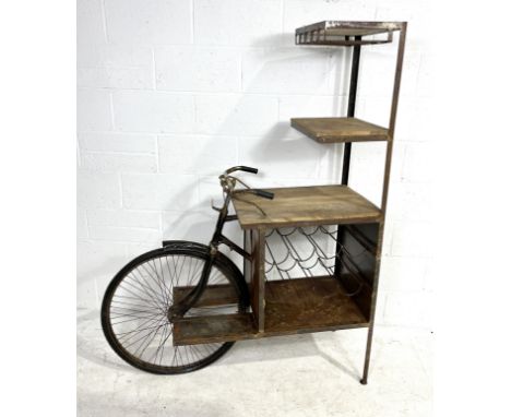 A vintage bicycle bar counter complete with wine/ bottle rack, counter tops and glass hangers