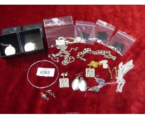 A small quantity of jewellery to include; gem stone earrings, two 925 silver St. Christopher pendants on chains, a bangle, ne