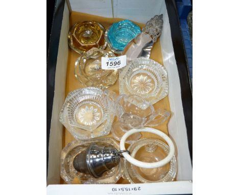 A quantity of clear and coloured glass salts (some chips) plus an old baby rattle and tea caddy.