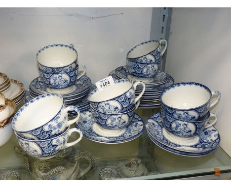 A Woods & Son 'Buddha' design blue and white bone china tea set including ten cups and twelve saucers, twelve tea plates and 