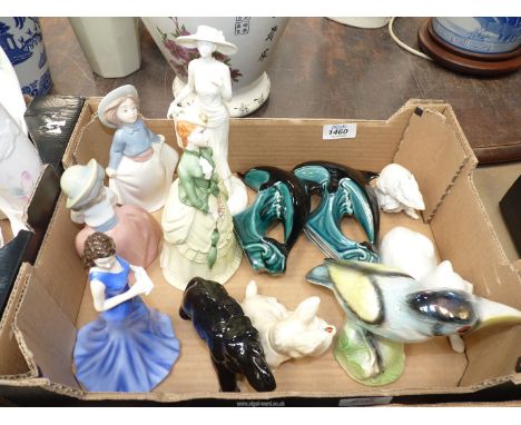 A quantity of animal ornaments and figures including Kaiser cat and mouse, Poole dolphins, Jena toucan, Sylvac elephant, Nao,