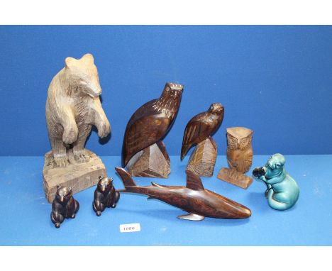 A small quantity of miscellaneous treen animals, to include a heavy carved bear, two carved eagles, a shark, an owl and two r