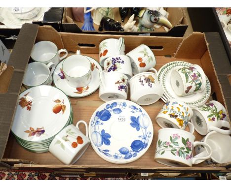A quantity of Royal Worcester 'Evesham Vale' and Portmeirion 'Botanical Garden' cups and saucers.
