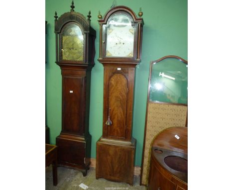A boxwood strung Mahogany cased Longcase Clock having an arched dial with Arabic numerals, inset second hand and date registe