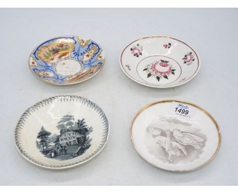 Four old saucers, including one with birds and shell detail in grey, marked 557 to base. one with detail of a Swiss style cha