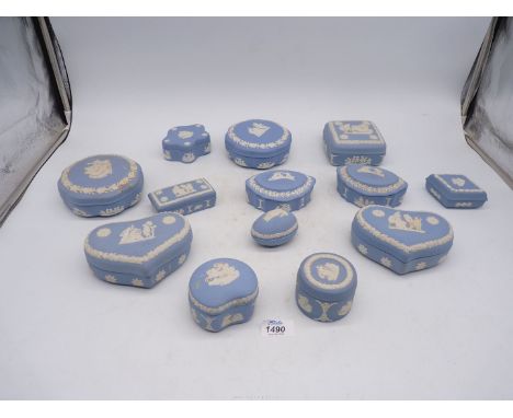 A quantity of pale blue Wedgwood Jasperware trinket boxes including heart shape etc.