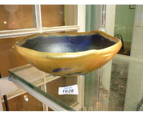 A thick heavy Art Glass Bowl in blue tones with lemon patches, all covered in clear matt finish, outer layer in mustard with 