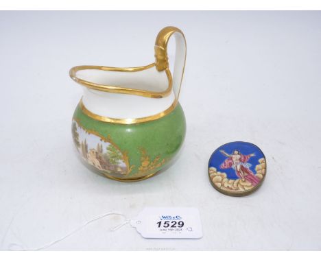 A Russian enamel medallion, late 18th century, painted with the Risen Christ, 7 cm x 5 cm and a porcelain jug probably Russia