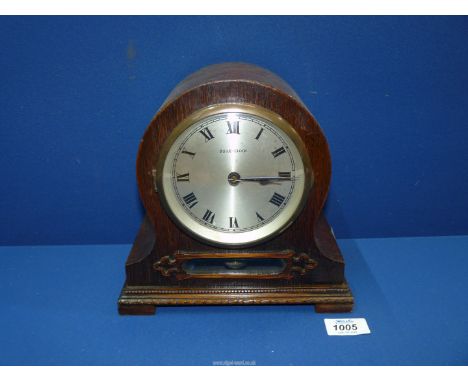 A French Bulle Electromagnetic Mantle Clock, circa 1920, an attractive style oak case with glass aperture at the front for pe