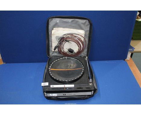 An EMI Autofix 100 Radio Direction Finder with case and instruction manual.