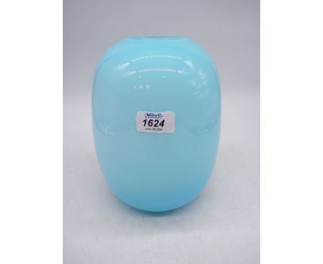 A heavy glass vase of Swollen ovoid form, having inverted thick rim in light blue over white interior. 9 1/4" tall x 6 1/2" w