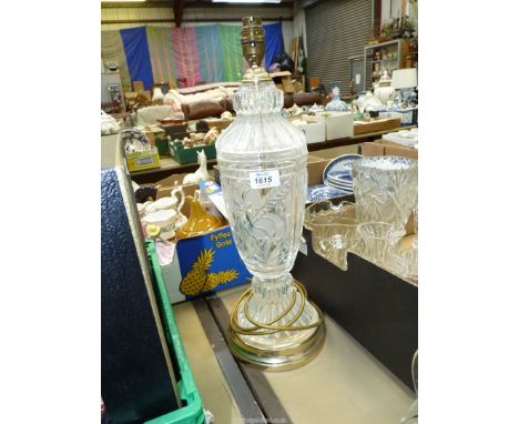 A large glass table lamp with etched floral design 19" tall.